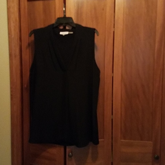 Calvin Klein short sleeved black blouse. - Picture 1 of 2
